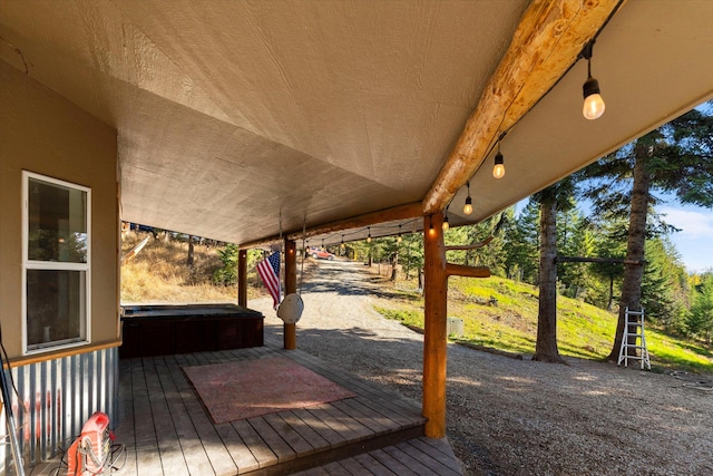 1424 Bierney Creek Rd, Lakeside, MT 59922 - wooden deck featuring a hot tub