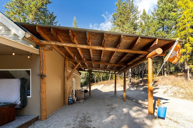 1424 Bierney Creek Rd, Lakeside, MT 59922 - view of parking / parking lot featuring a carport