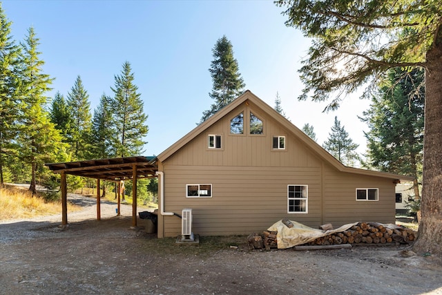 view of side of home with a pergola