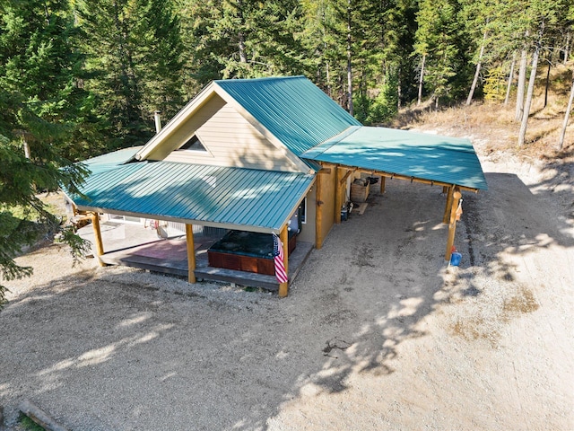 1424 Bierney Creek Rd, Lakeside, MT 59922 - view of outdoor structure featuring gravel driveway and a view of trees