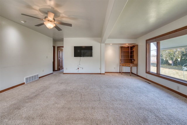 unfurnished living room with carpet flooring and ceiling fan