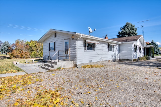 back of property with a patio