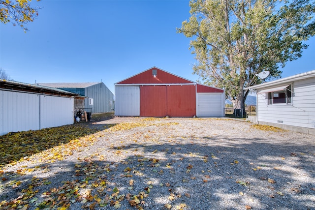 view of outbuilding featuring a garage