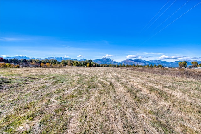 view of mountain feature with a rural view