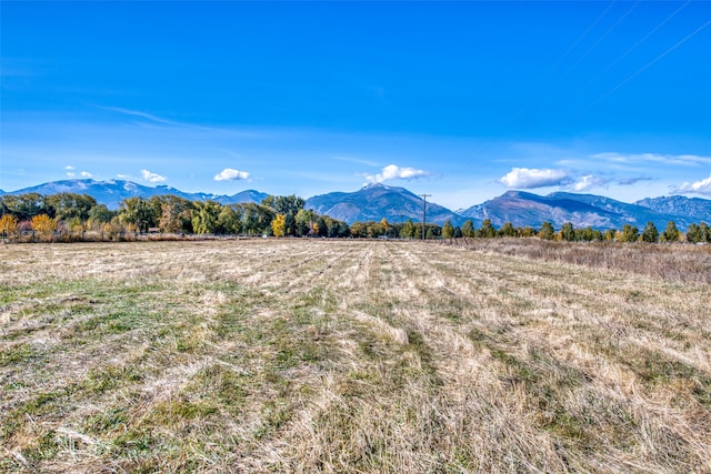 mountain view featuring a rural view