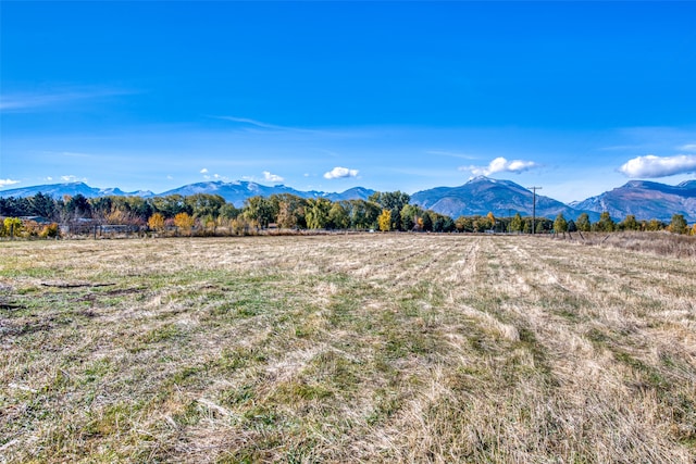 view of mountain feature with a rural view