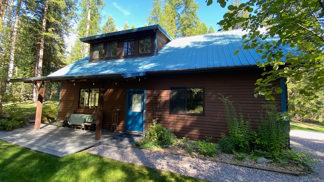 rear view of house with a patio area