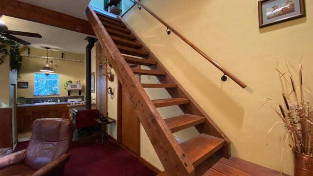 132 Little Mountain Rd, Whitefish, MT 59937 - staircase with ceiling fan