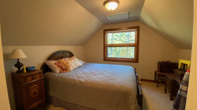 132 Little Mountain Rd, Whitefish, MT 59937 - bedroom featuring carpet flooring, vaulted ceiling, and baseboards