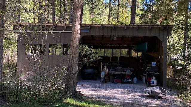 132 Little Mountain Rd, Whitefish, MT 59937 - view of parking featuring a detached carport