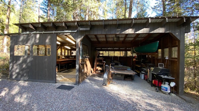 132 Little Mountain Rd, Whitefish, MT 59937 - view of patio / terrace with an outbuilding and a pole building