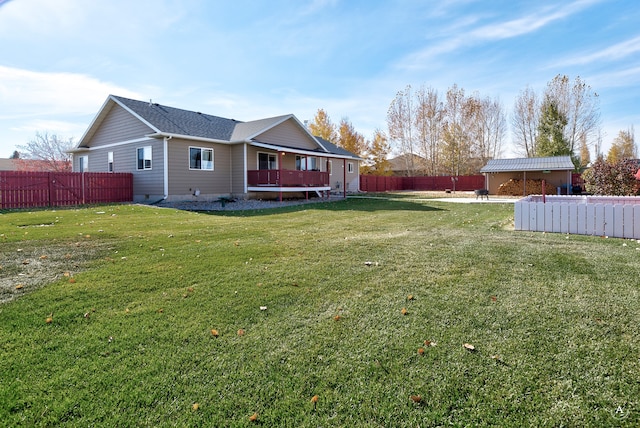 view of yard featuring a wooden deck