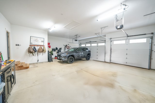 garage featuring a garage door opener