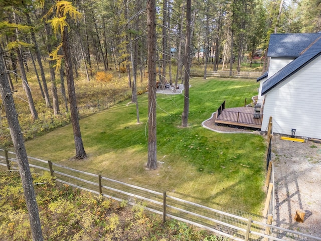 view of yard with a wooden deck