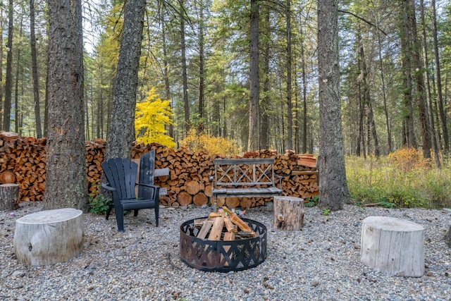 view of patio with a fire pit