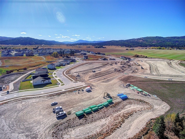 1360 Morning Eagle Dr, Kalispell, MT 59901 - drone / aerial view of a mountainous background