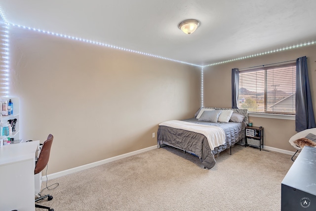 bedroom featuring light colored carpet