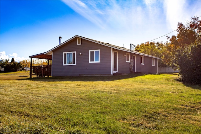 view of property exterior featuring a lawn