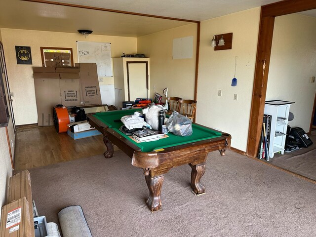 recreation room featuring pool table and hardwood / wood-style flooring