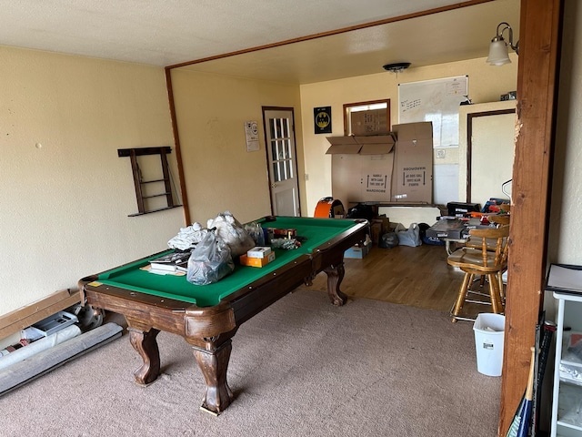 rec room with billiards, wood finished floors, and carpet flooring