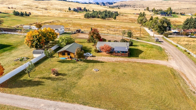 birds eye view of property featuring a rural view