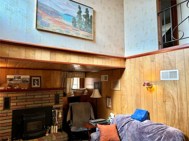 living room featuring wood walls