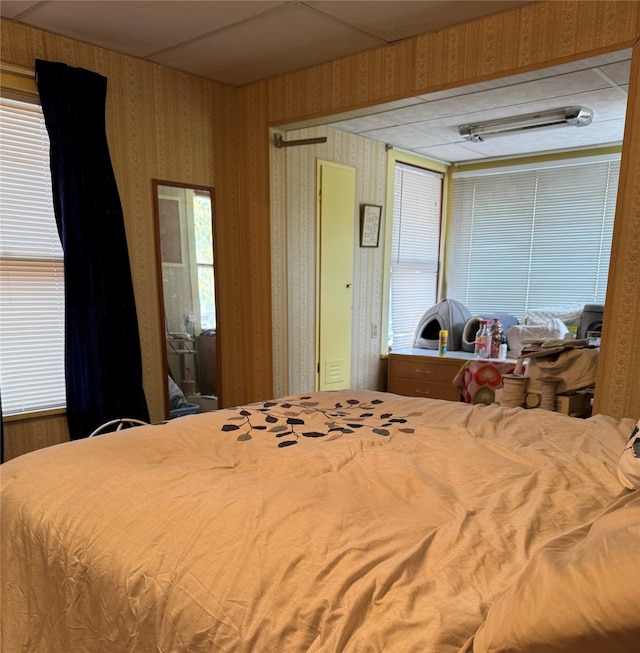 bedroom featuring a paneled ceiling