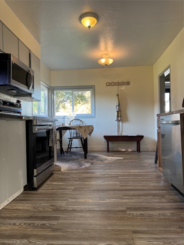 kitchen featuring wooden walls