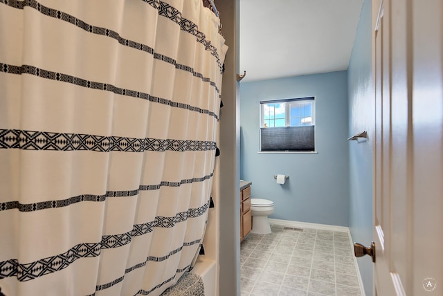 890 Antares Rd, Helena, MT 59602 - bathroom featuring toilet and baseboards