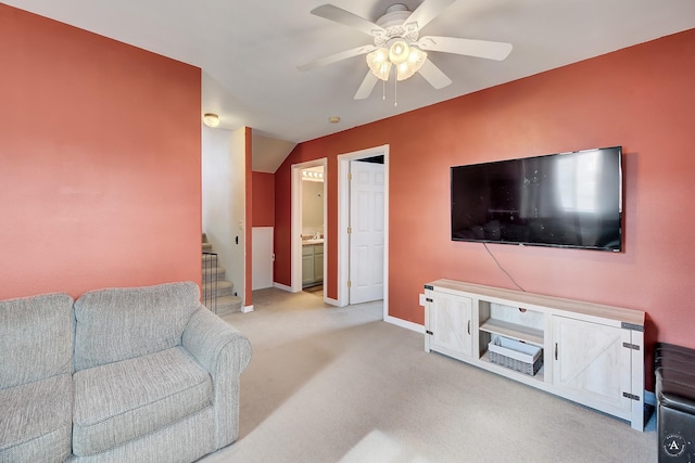 living room featuring ceiling fan and light carpet