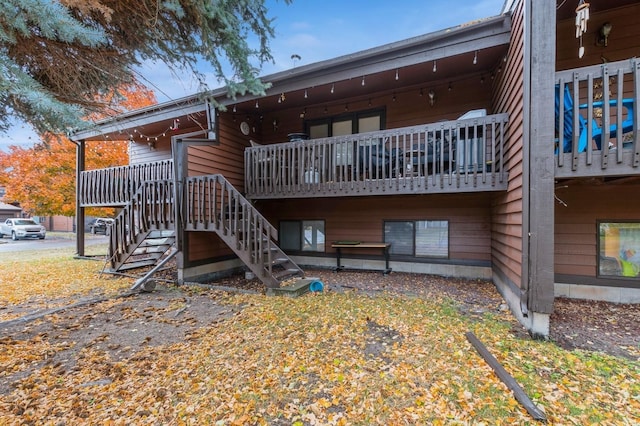 back of house with stairway