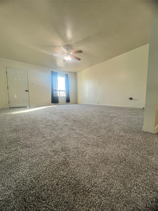 416 2nd St, Deer Lodge, MT 59722 - carpeted spare room featuring ceiling fan and baseboards
