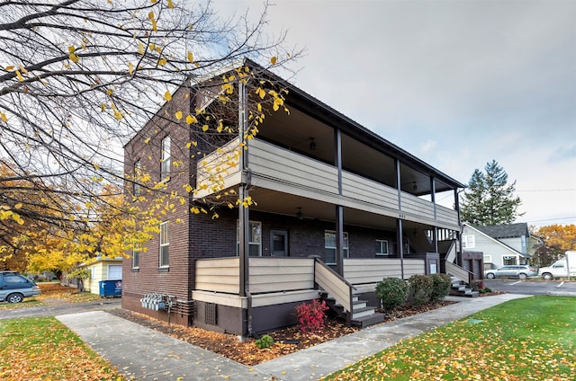 view of front of house with a balcony