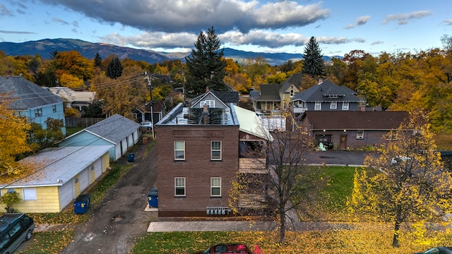 drone / aerial view featuring a mountain view