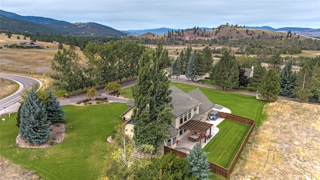 birds eye view of property featuring a mountain view