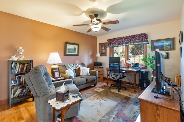 office space featuring light hardwood / wood-style floors and ceiling fan