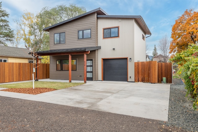 view of front of property with a garage