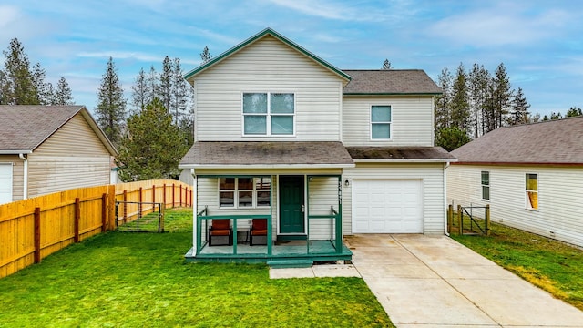 view of front of house with covered porch, a front lawn, and a garage