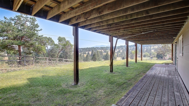 view of yard featuring a wooden deck