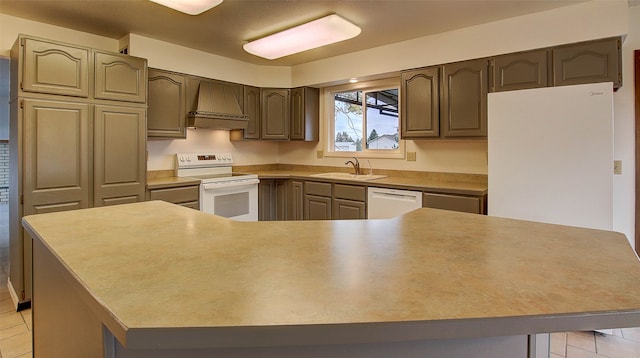 kitchen featuring sink, custom exhaust hood, a center island, and white appliances