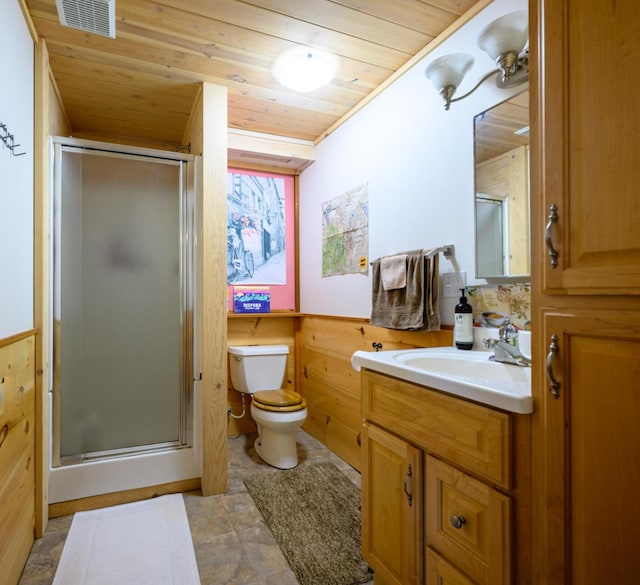 bathroom featuring vanity, toilet, wooden ceiling, and a shower with door