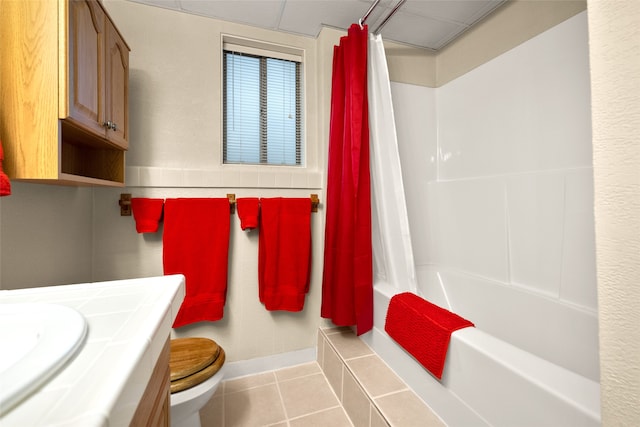 full bathroom with toilet, shower / tub combo with curtain, vanity, and tile patterned floors