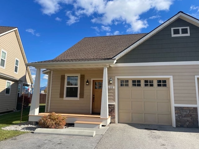 view of front of home with a garage