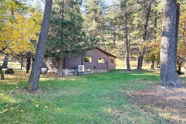 view of home's exterior featuring a yard