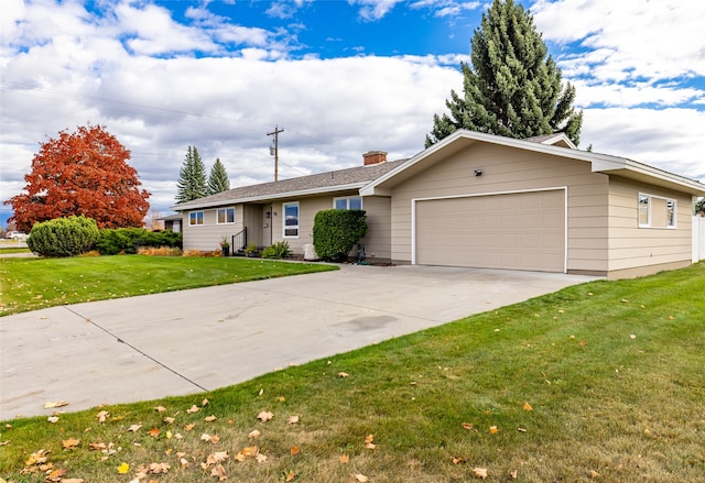 ranch-style home with a front lawn and a garage