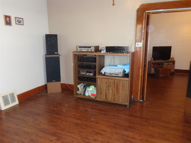 interior space with dark wood-type flooring