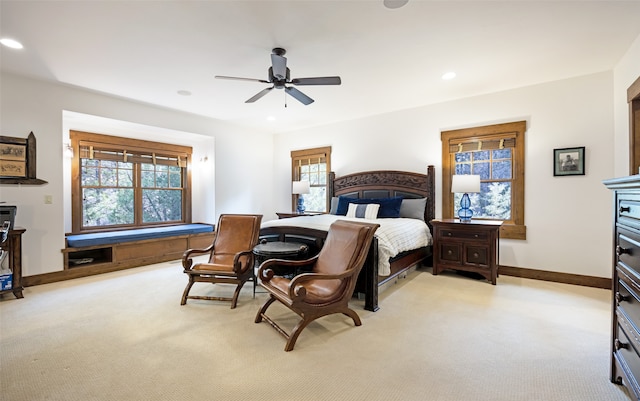 bedroom with light colored carpet and ceiling fan