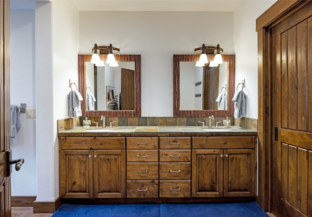 bathroom with vanity and tile patterned floors