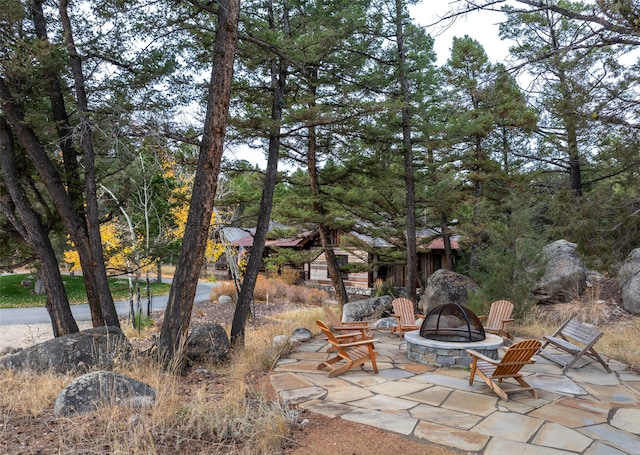 view of patio featuring a fire pit