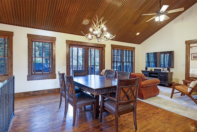 dining space featuring wood ceiling, ceiling fan with notable chandelier, and hardwood / wood-style floors